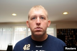 FILE - Darren Wilson, who resigned from the Ferguson Police Department, is pictured in an undated handout photo.