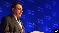 FILE --This March 6, 2013 handout file image provided by the Friends of Nizar Zakka, shows Nizar Zakka, a Lebanese technology expert and advocate for Internet freedom, delivering a speech during the MENA ICT Forum conference in Jordan.