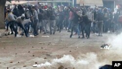 Demonstrators take the streets during anti-government protests, in Tebourba, south of the Tunisian capital, Tunis, Jan. 9, 2018. (AP Photo/Anis Ben Ali)