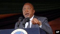 FILE - Kenyan President Uhuru Kenyatta speaks during Jamhuri Day celebrations (Independence Day) at Nyayo Stadium in Nairobi, Dec. 12, 2016. Kenyatta says his Jubilee Party will hold new primary voting April 24-25, 2017.