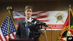 FILE - Milwaukee District Attorney John Chisholm, above, has charged Clifton Blackwell, 61, with a hate crime in an acid attack Nov. 1, 2019, in Milwaukee, Wis.