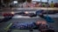 Migrants sleep on a street near the Chaparral border crossing in Tijuana, Mexico, Nov. 23, 2018. 