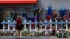 FILE - A woman looks at a makeshift memorial for the victims at Bourbon Street days after a U.S. Army veteran drove his truck into the crowded French Quarter on New Year's Day in New Orleans, Louisiana, Jan. 6, 2025. 