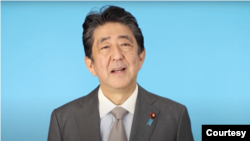 日本前首相安倍晋三2021年12月14日通过视讯在台湾远景基金会对话会上讲话（远景基金会视讯截屏）