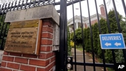 A metal fence surrounds the residence of Russia's consul general, March 26, 2018, in Seattle, Washington. 
