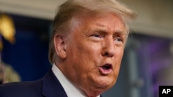 President Donald Trump speaks during a news conference at the White House, July 23, 2020, in Washington. 