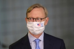 FILE - U.S. special envoy for Iran, Brian Hook, attends a press briefing in Jerusalem, June 30, 2020.