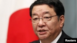 Japan's Chief Cabinet Secretary Osamu Fujimura speaks during a news conference in Tokyo, September 2, 2011.
