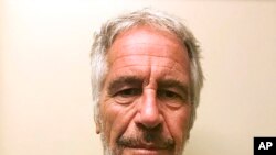 FILE - This March 28, 2017, file photo, provided by the New York State Sex Offender Registry shows Jeffrey Epstein.