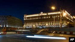 In this photo taken on July 24, 2017, a car passes the building of the Federal Security Service (Soviet KGB successor) in Lubyanskaya Square in Moscow, Russia. 