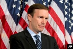 FILE - Sen. Chris Murphy, D-Conn., appears before reporters on Capitol Hill in Washington, June 20, 2016.