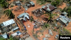 Destroyed houses and other buildings are left in the wake of Tropical Cyclone Chido in Pemba, Mozambique, on Dec. 18, 2024.