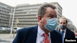 Britain's chief Brexit negotiator David Frost arrives at Brussels-South railway station, in Brussels, Belgium, Dec. 6, 2020.
