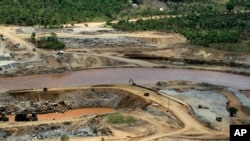 FILE - Blue Nile river flows near the site of the planned Grand Ethiopian Renaissance Dam near Assosa in the Benishangul-Gumuz region of Ethiopia, near Sudan, some 800 kilometers (500 miles) from Addis Ababa.