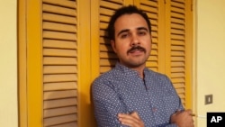 FILE - Egyptian author Ahmed Naji poses for a photo in Cairo, Egypt, in this undated image. Naji was sentenced to two years in jail Feb. 20, 2016, by a Cairo appeals court for publishing a sexually explicit excerpt of his novel that prosecutors said violated “public modesty.”