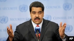 FILE - Venezuelan President Nicolas Maduro speaks to reporters at United Nations headquarters in New York, July 28, 2015.