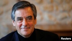 FILE - Francois Fillon, member of the Les Republicains political party and 2017 presidential candidate, attends an event in Chantenay-Villedieu, France, Dec. 1, 2016. Fillon is a former prime minister. 