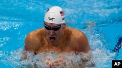 Chase Kalisz of the United States swims in the Men's 400m individual medley at the 2020 Summer Olympics, July 25, 2021, in Tokyo, Japan.