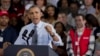 President Barack Obama speaks to Costco employees during a visit to a local Costco in Lanham, Maryland, Jan. 29, 2014. 