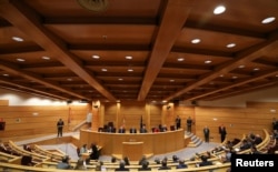 Lawmakers attend a Senate committee meeting to review measures of article 155 which, if approved, would impose direct rule on Catalonia, revoking the wealthy region's autonomy, at the Senate, in Madrid, Spain, Oct. 24, 2017.