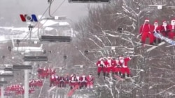 VOA Trending Topic: Ratusan Sinterklas Kumpulkan Dana Amal dengan Skiing dan Snowboarding