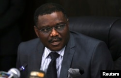 FILE - Nigeria's Minister of Health Onyebuchi Chukwu speaks at the media briefing on updates about the Ebola outbreak in Nigeria at his office in Abuja, Aug. 14, 2014.
