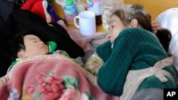 Ảnh minh họa - Một người phụ nữ tr&#244;ng ch&#225;u ngủ ở Nhật Bản.