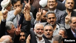Palestinian group Hamas' top leader Ismail Haniyeh attends Iran's new President, Masoud Pezeshkian's swearing-in ceremony at the parliament in Tehran, Iran, July 30, 2024. Majid Asgaripour/WANA (West Asia News Agency) via REUTERS 