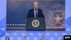 Президент Дональд Трамп выступает в режиме онлайн на Всемирном экономическом форуме в Давосе. 23 января 2025 г. 