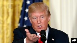 FILE - In this photo taken Aug. 28, 2017, President Donald Trump speaks in the East Room of the White House in Washington. Trump later said "all options are on the table" in terms of a U.S. response to North Korea's launch of a missile over Japan.