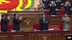 In this frame grab taken from TV, North Korean leader Kim Jong Un, center, applauds during the ruling party congress in Pyongyang, North Korea, May 7, 2016. The U.S. Treasury Department on Wednesday designated North Korea as a "primary money-laundering concern.'' 