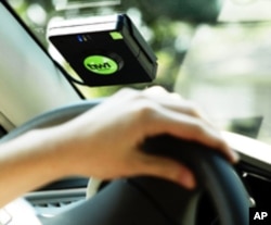 The Tiwi in-vehicle monitoring device mentors teens with verbal alerts to help them develop better driving habits.