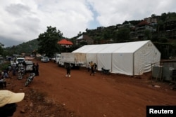 FILE - A World Food Program tent is seen at an internally displaced persons camp in Regent, Sierra Leone, Aug. 21, 2017.