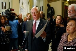 FILE - U.S. House Minority Whip Steny Hoyer speaks to the media at the Capitol in Washington, Oct. 12, 2013.