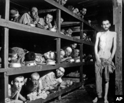 Inmates of the Buchenwald concentration camp are seen inside their barracks a few days after U.S troops liberated the camp near Weimar, Germany in this April 16, 1945 file photo.