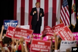 Republican presidential candidate Donald Trump campaigns at the Jacksonville Equestrian Center in Jacksonville, Fla, Nov. 3, 2016.