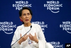 FILE - Aung San Suu Kyi, Myanmar's civilian leader, speaks at the World Economic Forum's meeting at the National Convention Center in Hanoi, Vietnam, Sept. 13, 2018.
