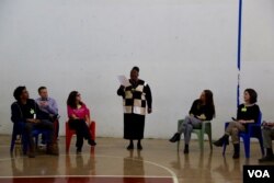 Pastor Johnson recites “My Continuing Passion” before an audience of Stella Adler Studio of Acting actors and inmates at Rikers Island, New York.