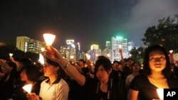 资料照片：2012年6月4日香港民众举行纪念六四事件23周年。