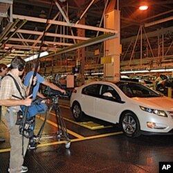 Filmmaker Chris Paine's crew films the General Motors Chevy Volt production line.