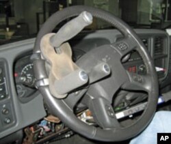 Kitchin uses a specially adapted wheel to steer his vehicle.