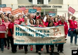 Supporters of single-payer health care march to the Capitol in Sacramento, Calif., April 26, 2017.