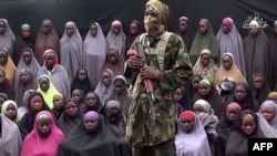 FILE - Boko Haram on Aug. 14, 2016 released a video of the girls allegedly kidnapped from Chibok in April 2014, showing some who are still alive and claiming others died in air strikes.