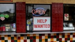 FILE PHOTO: A help wanted sign is posted at a taco stand in Solana Beach, Calif., July 17, 2017.