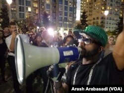 Protesters begin marching in Charlotte, North Carolina, Sept. 22, 2016. Demonstrators marched for a third night in the city, following the police shooting death of an African-American man earlier this week.
