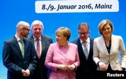 German Chancellor and leader of the Christian Democratic Union (CDU) Angela Merkel arrives with her deputy party leaders for the start of a two-day CDU party leadership meeting in Mainz, Germany, Jan. 8, 2016.