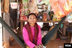 Pen Samath, 52, who owns a small shop along the road in Chantrey commune, said she can no longer communicate with ex-opposition officials, Feb. 14, 2018. (Sun Narin/VOA Khmer)