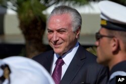 Brazil's President Michel Temer receives military honors during ceremony, in Brasilia, June 9, 2017.