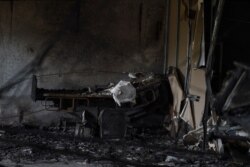 A charred hospital bed is seen at a ward of the Welfare Hospital after a fire broke out overnight, in Bharuch, some 190 kms from Ahmedabad, India, May 1, 2021.