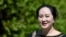 FILE - Huawei Technologies Chief Financial Officer Meng Wanzhou leaves her home to attend a court hearing in Vancouver, British Columbia, in June 2020.
